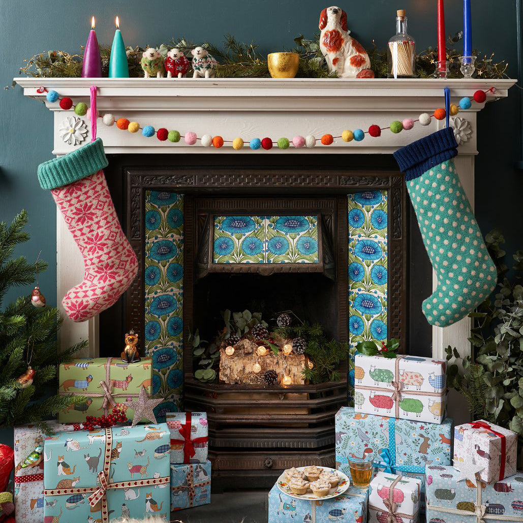 Mary Kilvert's Christmas fireplace, surrounded by stockings and presents