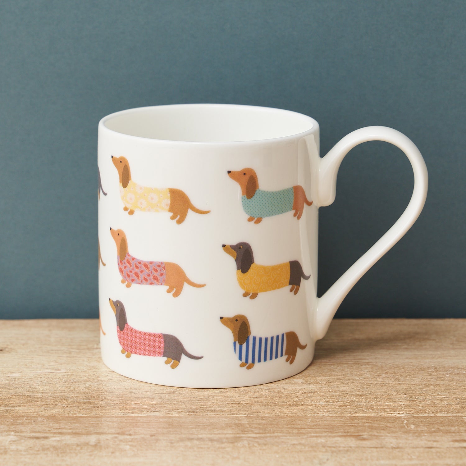 Dashing Dachshund Mug by Mary Kilvert