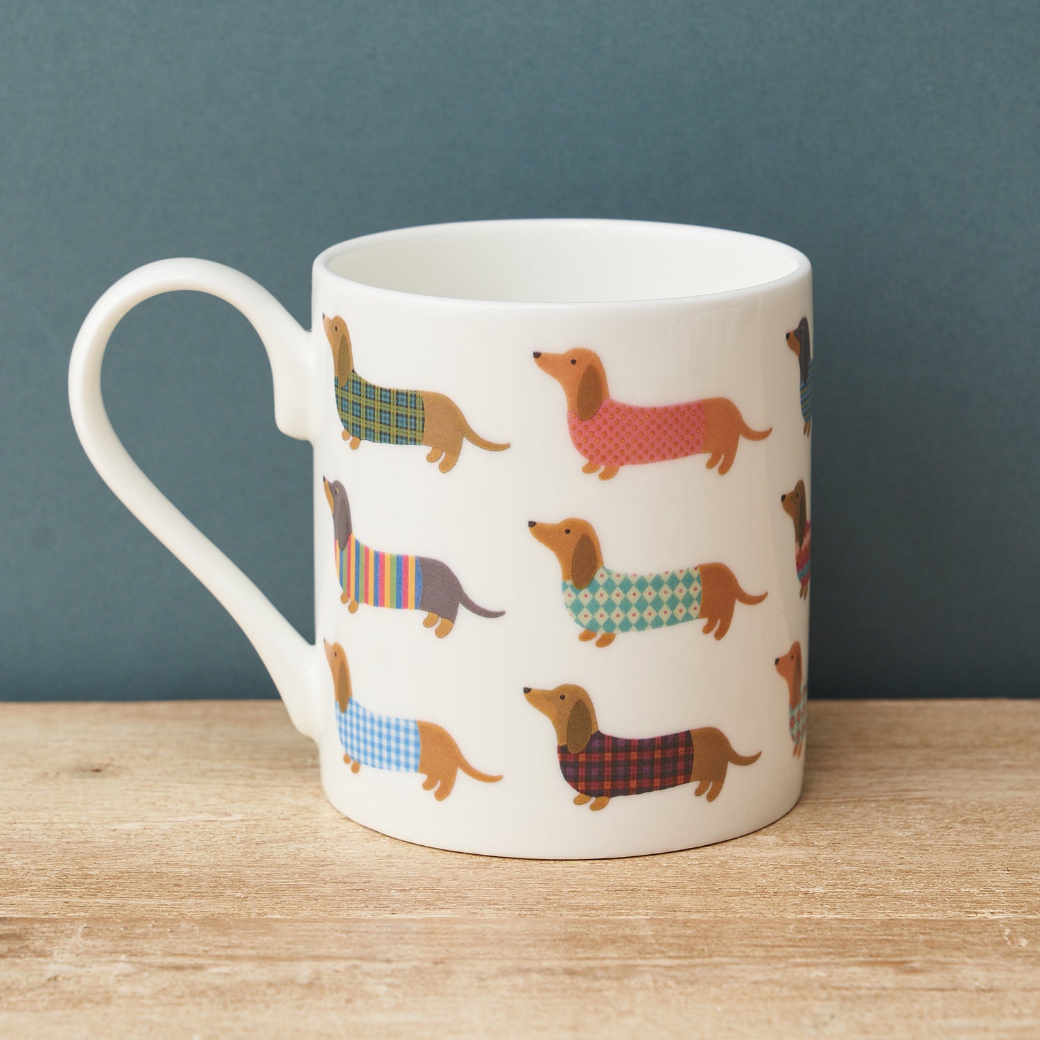 Dashing Dachshund Mug by Mary Kilvert