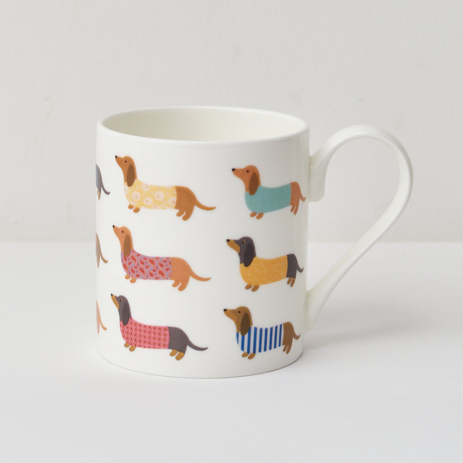 Dashing Dachshund Mug by Mary Kilvert