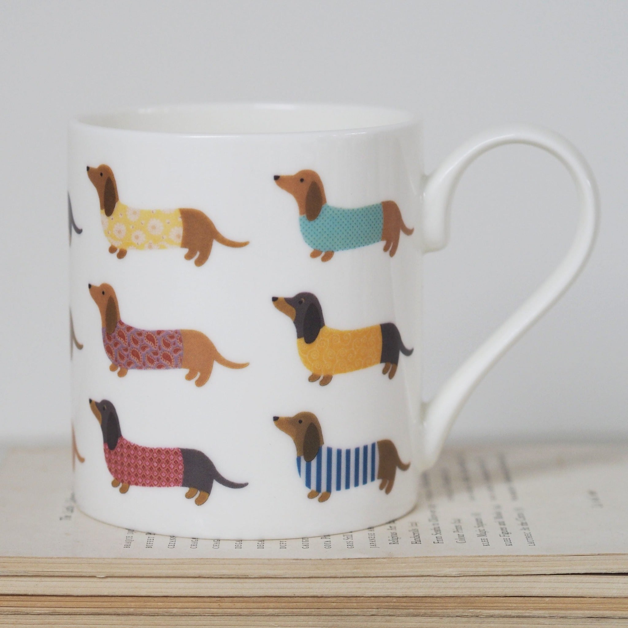 Dashing Dachshund Mug by Mary Kilvert